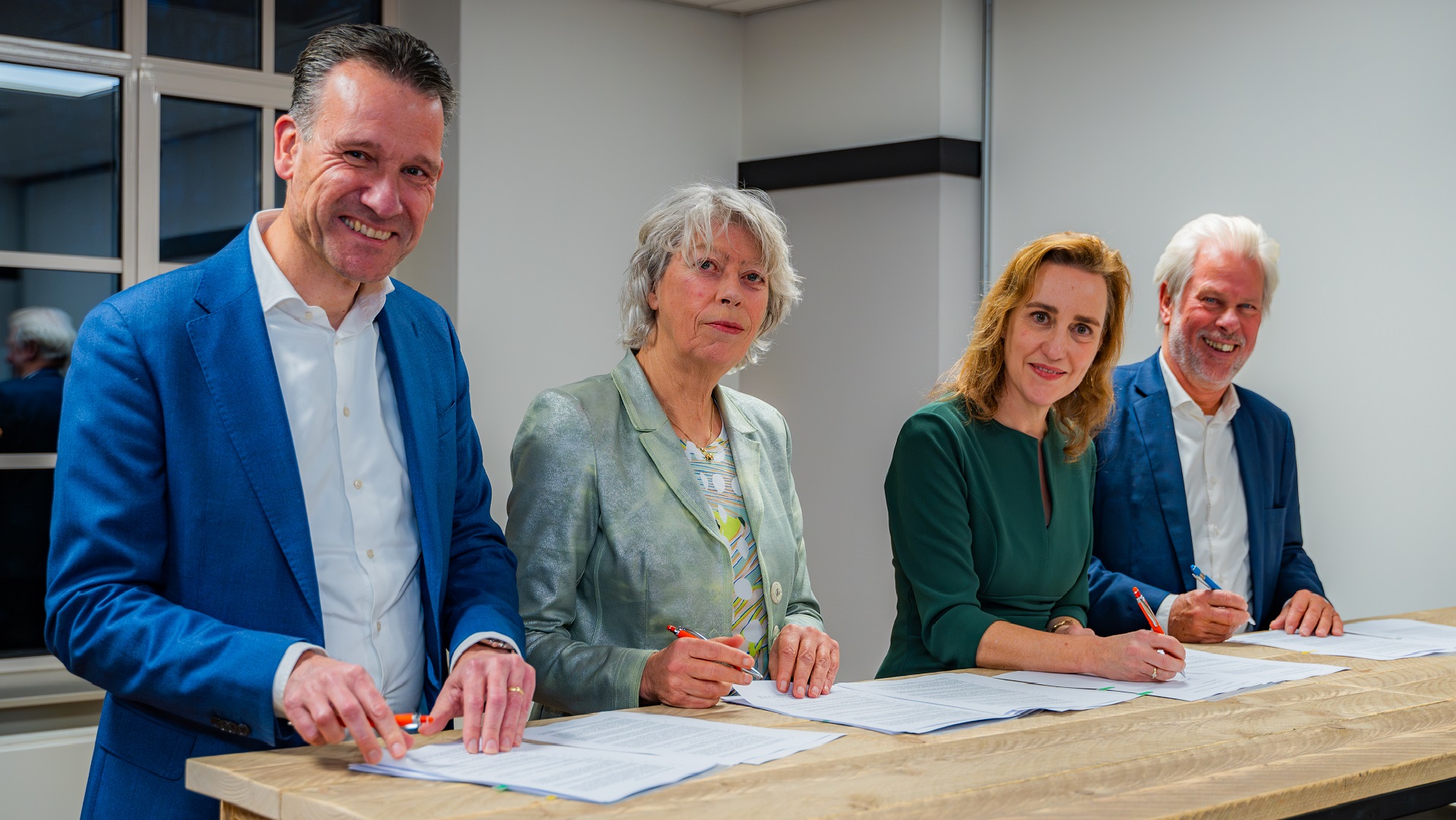 ondertekening van de overeenkomst om te beleggen in woningen